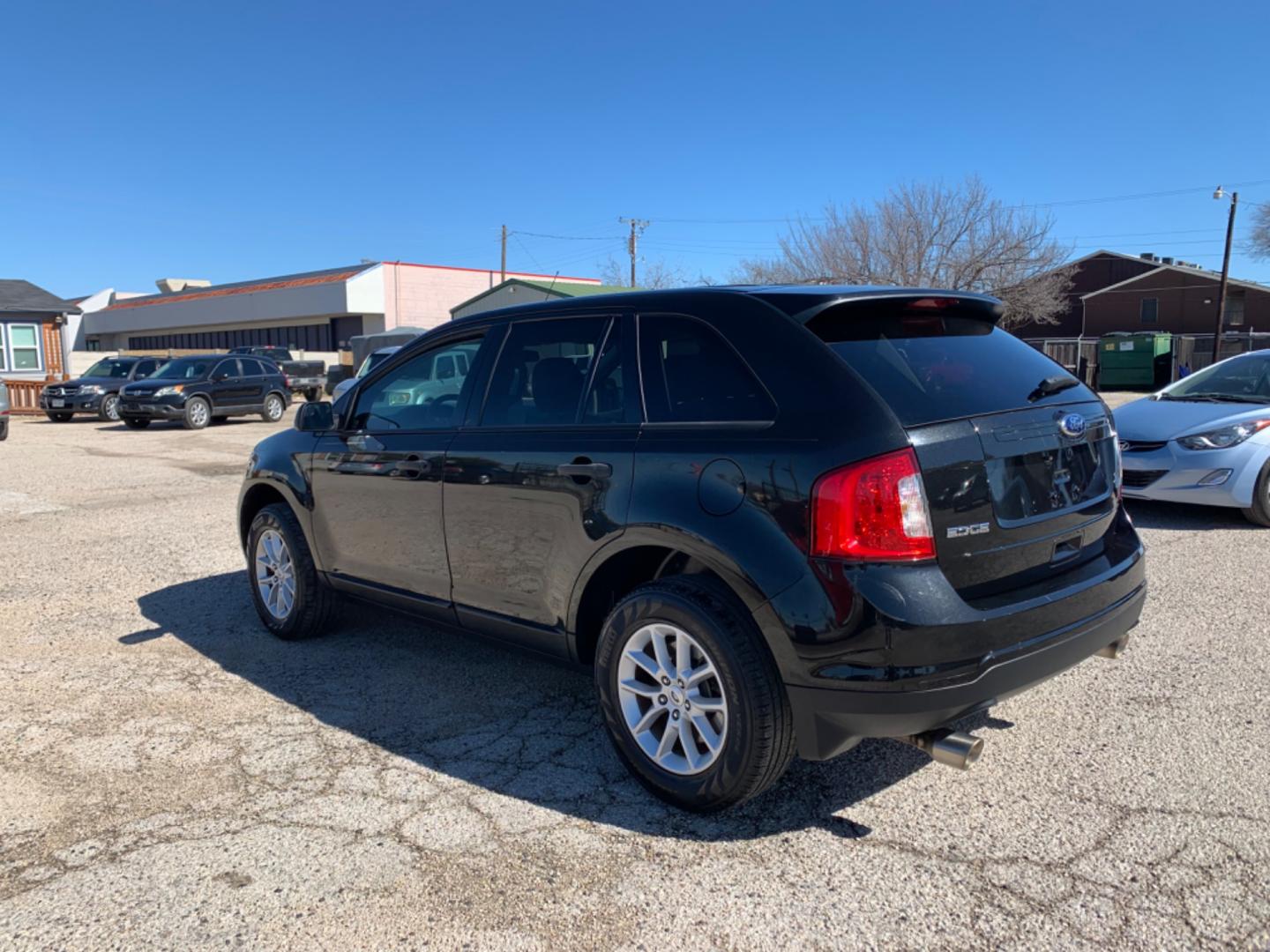 2013 Black /Tan Ford Edge (2FMDK3GC5DB) with an V6 - 3.5L 3496cc 213ci GAS MFI vin C - 4 valve DOHC engine, AUTOMATIC transmission, located at 1830 North Belt Line Road, Irving, TX, 75061, (469) 524-0199, 32.834373, -96.993584 - Photo#3